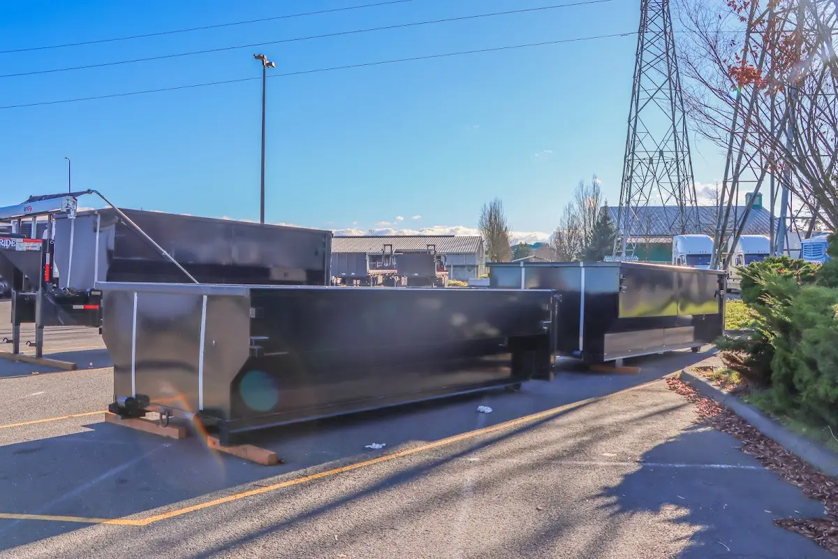Roll-off dumpster ready for waste disposal at job site for 6 Yard Dumpster Rental in Clarkston